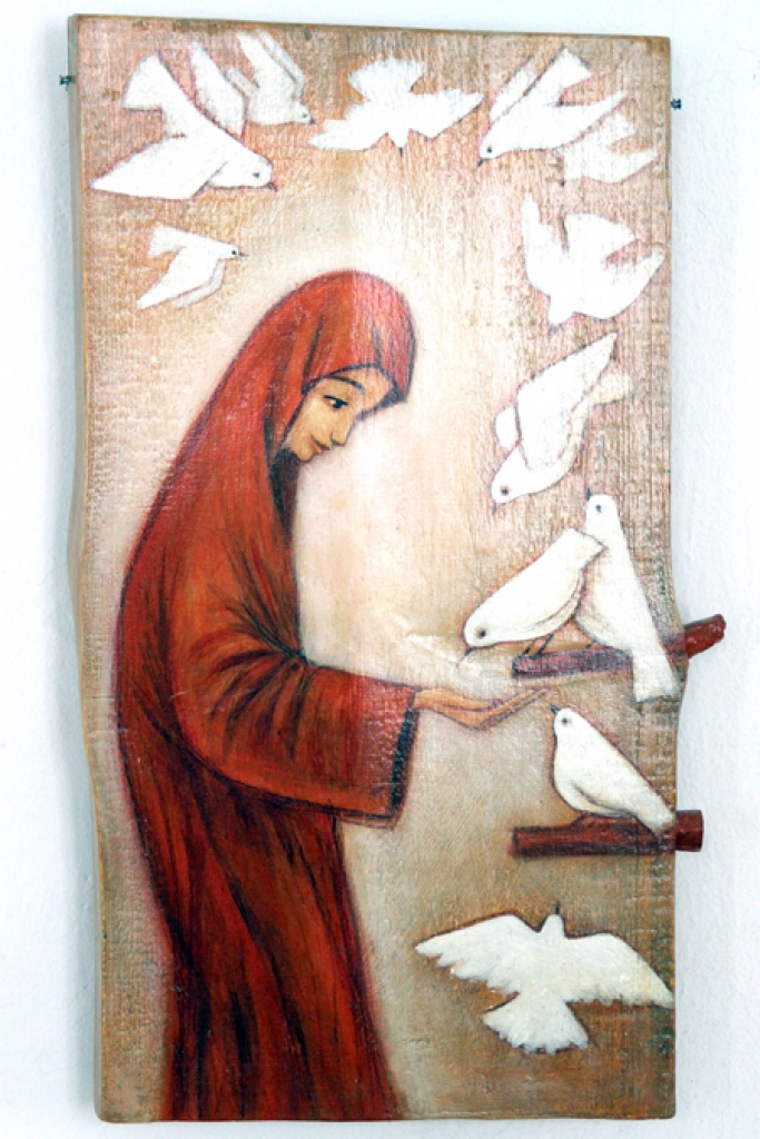 Marija Elizabetes namā baro dūjas.