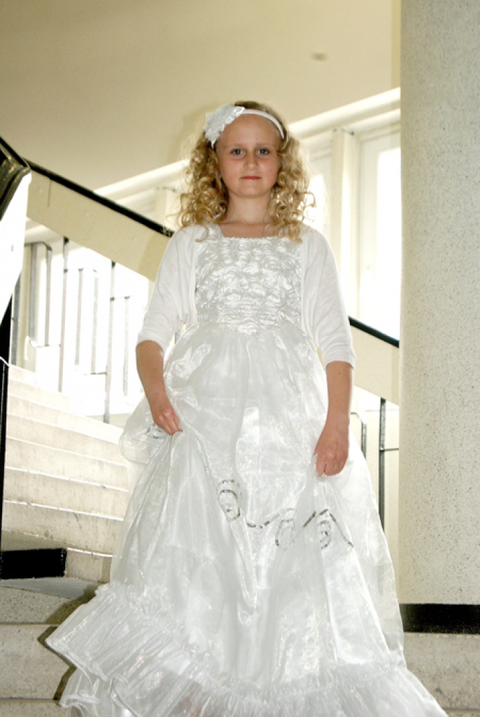 Patrīcija Spale dziesmu un deju festivālā «Koņina 2013».
Autors: no Spaļu ģimenes albuma